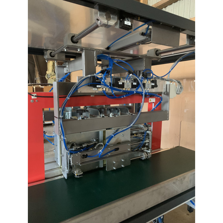 Inline compression and strapping unit